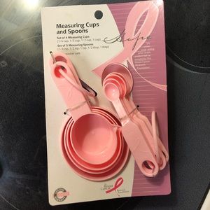 pink measuring spoons and cups